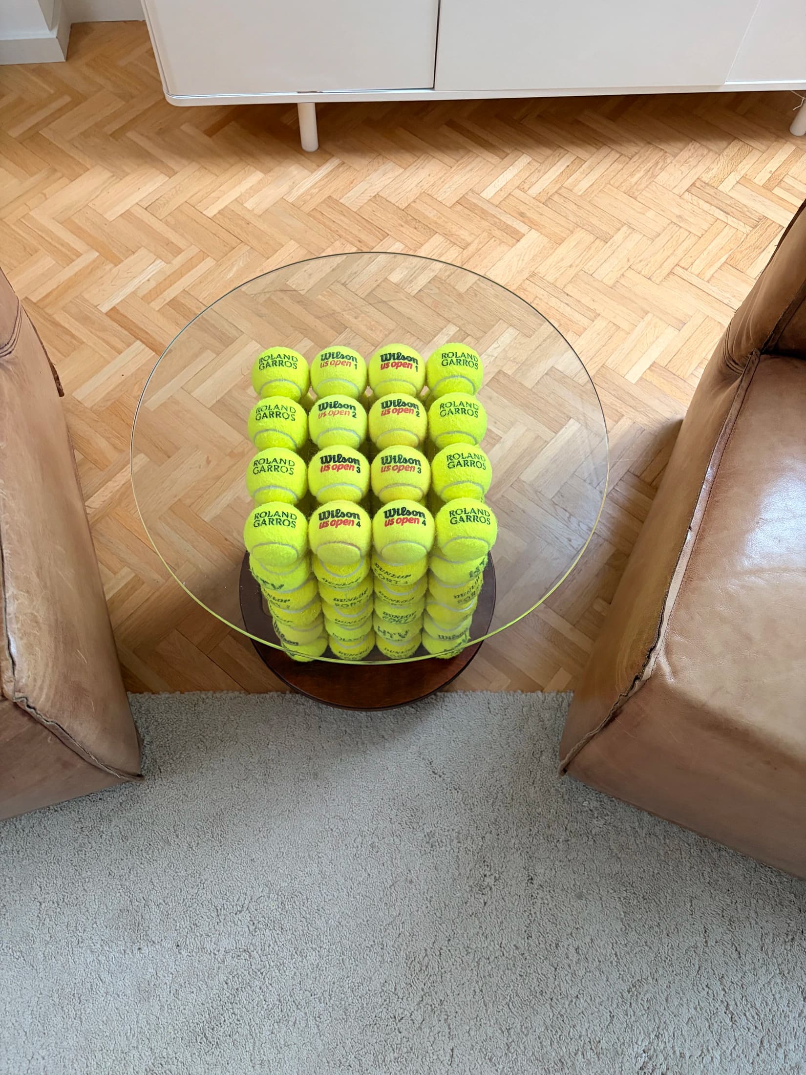 Coffee Table Boris No. 01 between two leather chairs